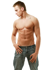 Fototapeta premium Healthy muscular man posing over white background