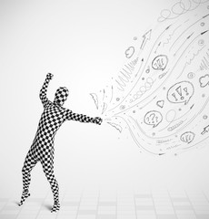 Guy in body suit morphsuit looking at sketches and doodles