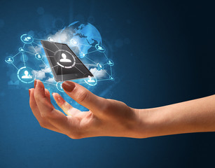 Cloud technology in the hand of a woman