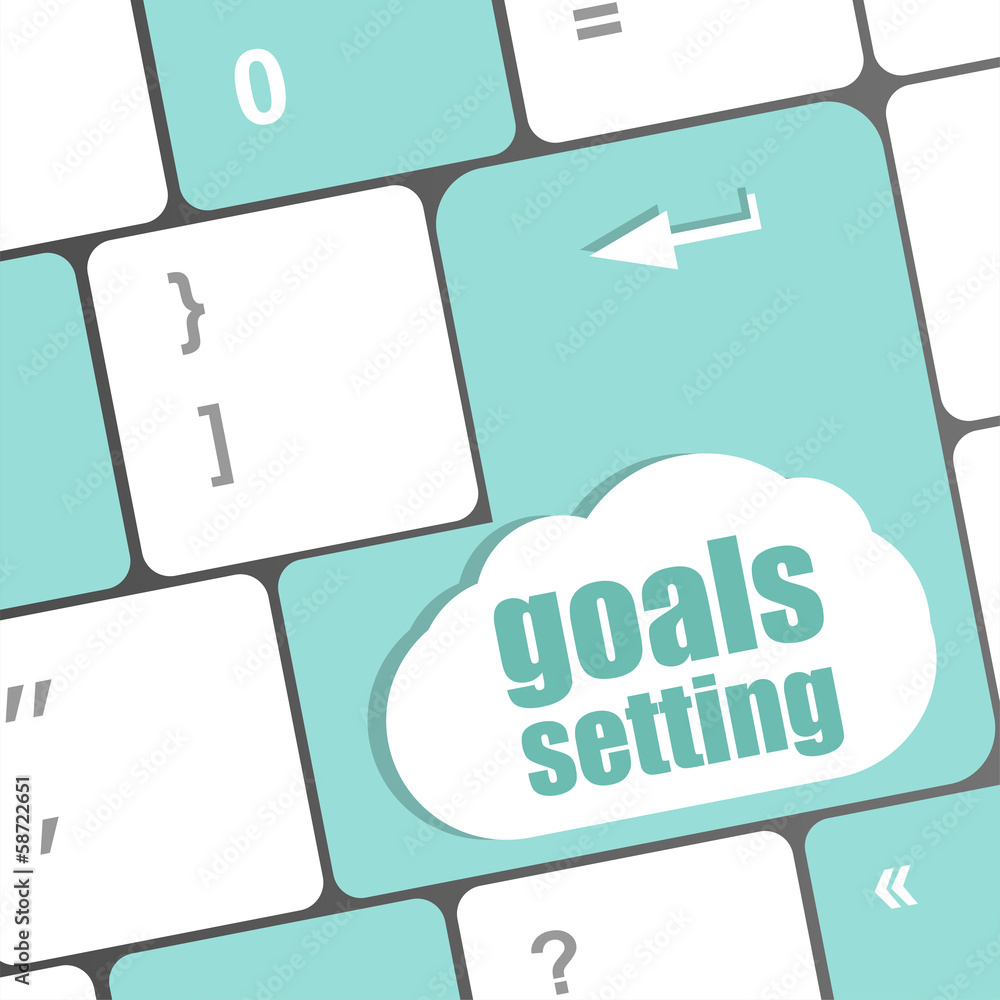 Poster goals setting button on keyboard with soft focus