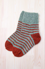 Obraz na płótnie Canvas Two knitted socks