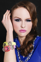 beautiful glamour girl with bright make-up-and color bracelet