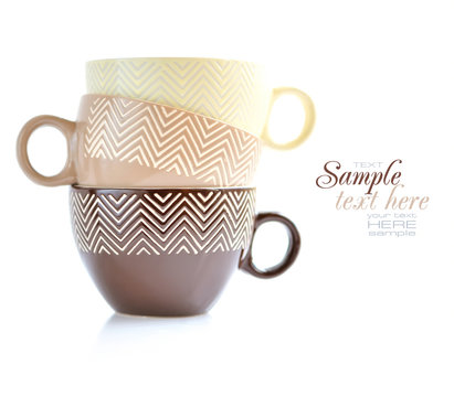 Pile of tea cups on a white background (with sample text)