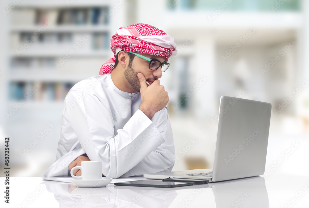 Wall mural arabian businessman working in office