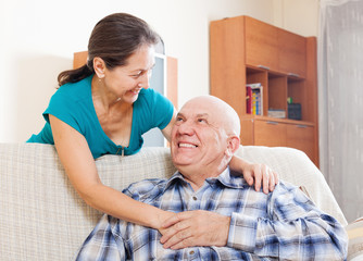 smiling senior man with happy wife