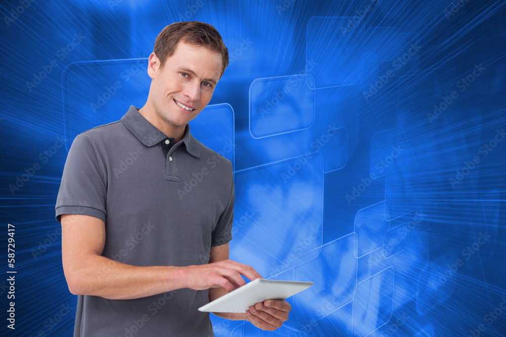Aufkleber Composite image of smiling young man with tablet computer