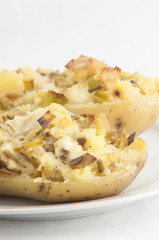 Baked potato stuffed with leek and cheese