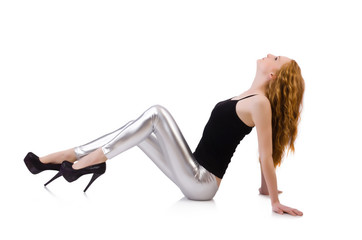 Young redhead girl in tight leggings