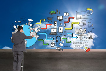 Composite image of businessman standing on ladder