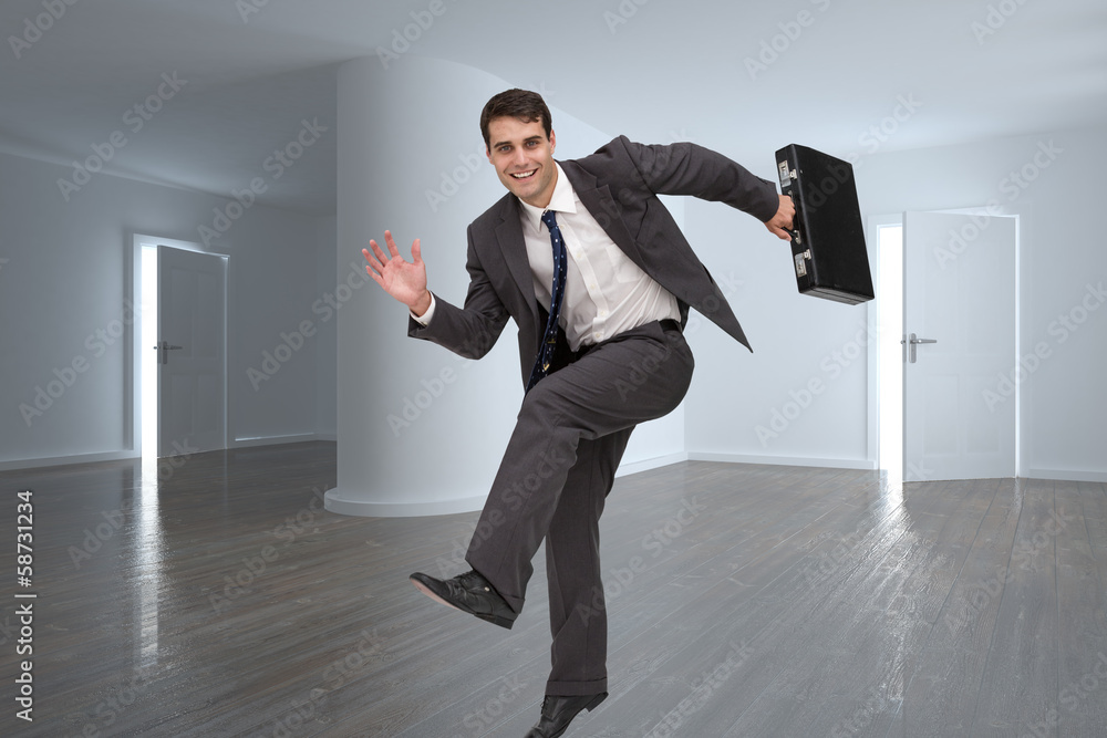 Poster Composite image of smiling businessman in a hury