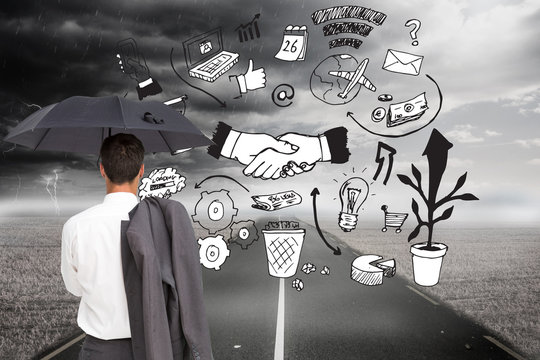 Composite image of businessman standing back to camera holding u - Powered by Adobe