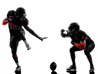 Fotobehang two american football players touchdown celebration silhouette © snaptitude