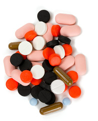 pile of different pills isolated on white