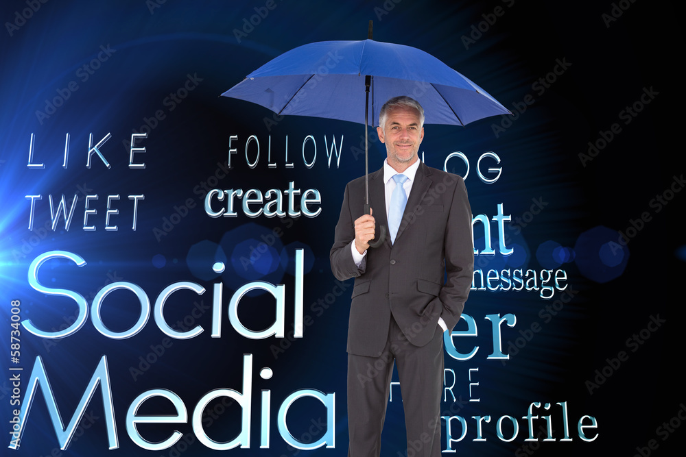 Poster composite image of businessman smiling at camera and holding blu