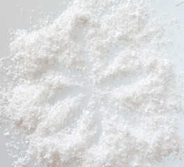 artificial snow on a white background. Abstract