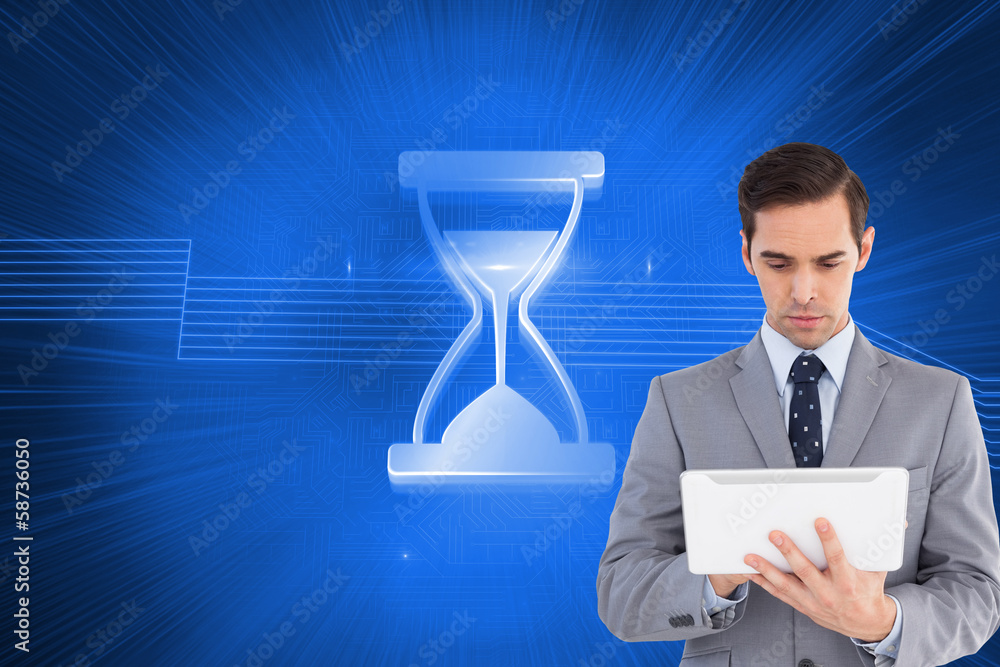Poster composite image of businessman holding a tablet computer