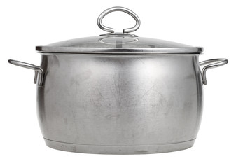 stainless steel saucepan covered by glass lid