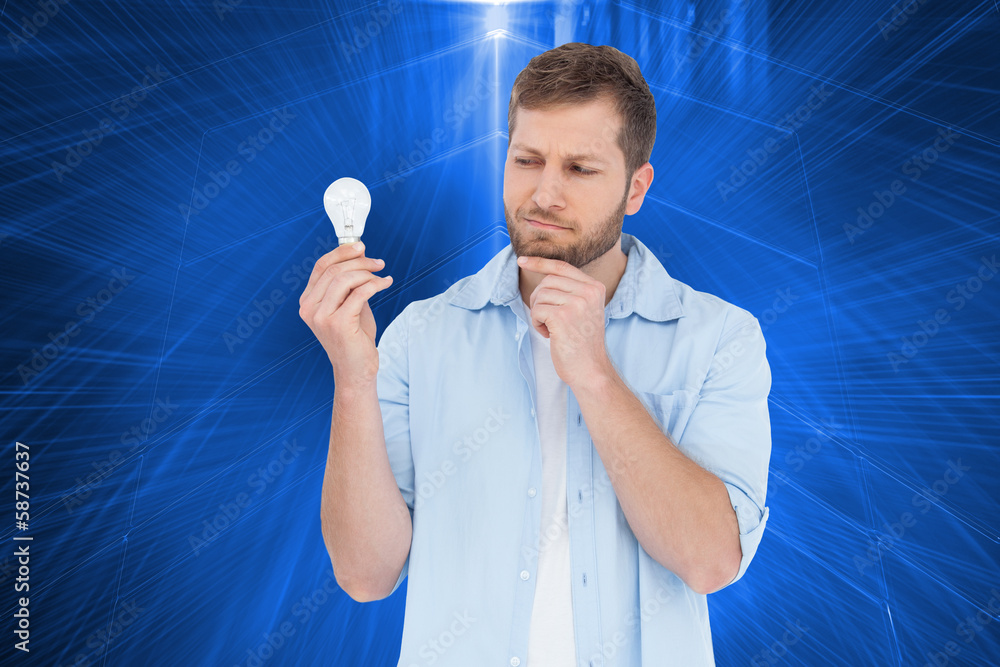 Poster composite image of sceptical model holding a bulb