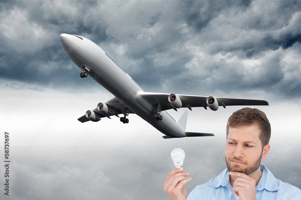 Poster composite image of sceptical model holding a bulb