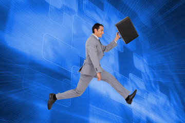 Composite image of businessman running with a suitcase