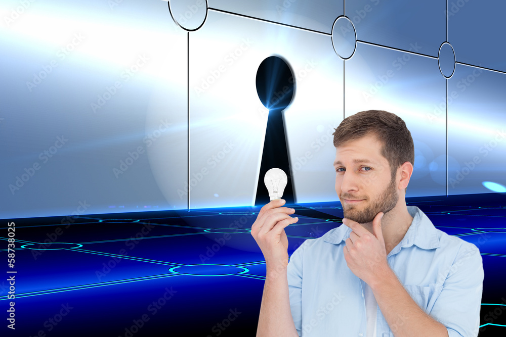 Poster composite image of handsome model holding a bulb