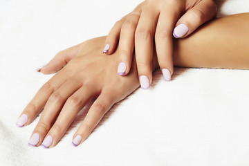 Obraz na płótnie Canvas manicure.female hands.in beauty salon.woman.shellac polish