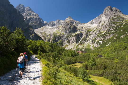 Tourists at chalet at Zelené pleso, High Tatras, Slovakia