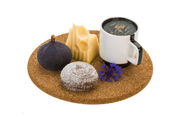 Breakfast with coffee, cake, fig and cheese