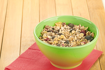 Delicious and healthy cereal in bowl with milk