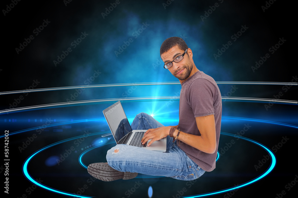 Poster Composite image of man wearing glasses sitting on floor using la