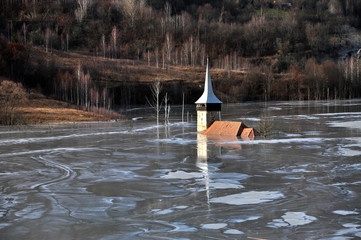 Abandoned church in a mud lake