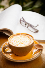 cup of coffee with book