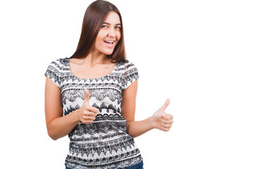Attractive young woman shows thumb up sign