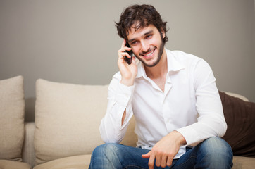 Young man talking on the phone