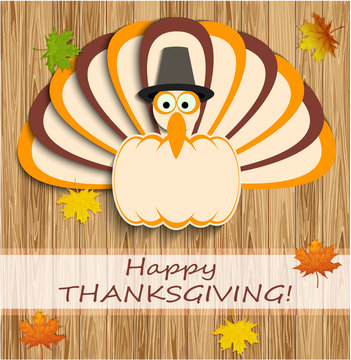 Happy Thanksgiving Card with Turkey on wood background