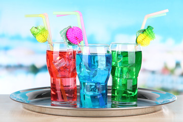 Different cocktails on bright background