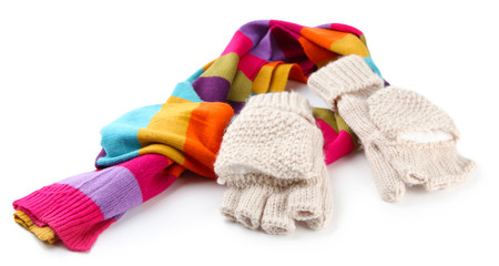 Fototapeta na wymiar Wool fingerless gloves and multicolor scarf, isolated on white
