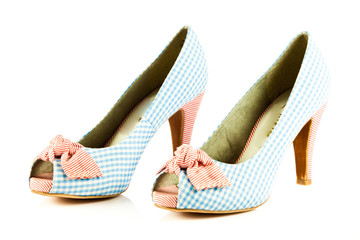 Naklejka premium High heel women shoes on white background