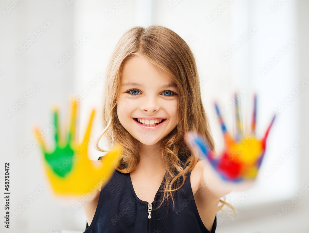 Poster smiling girl showing painted hands