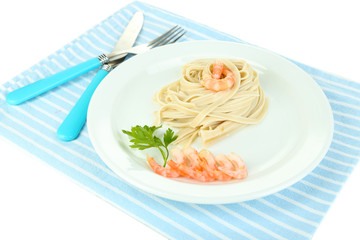 Pasta with shrimps on white plate, isolated on white