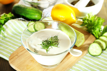 Cucumber yogurt in glass bowl,