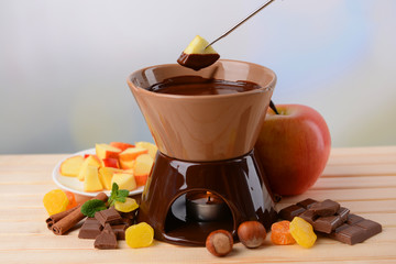 Chocolate fondue with fruits,