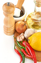 Fresh cooking ingredients with olive oil