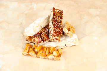 Tasty oriental sweets, on brown background