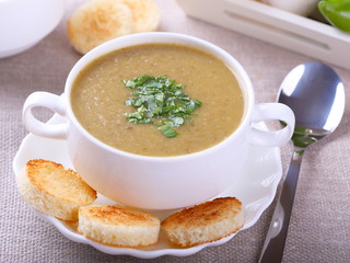 Mushroom cream soup with croutons - close up