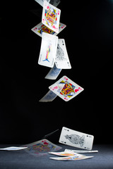 Playing cards falling