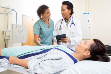 Medical Team And Patient In Hospital Room