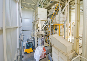 Interior of industrial plant where food for cows is mixing © Budimir Jevtic