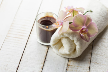 Bath towel and orchid.