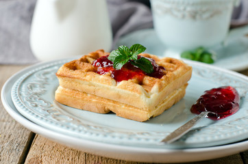 Waffles with jam for breakfast